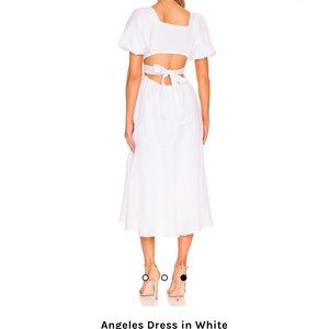 ASTR the label size medium in white needs dry cleaned worn 1x at bridal shower